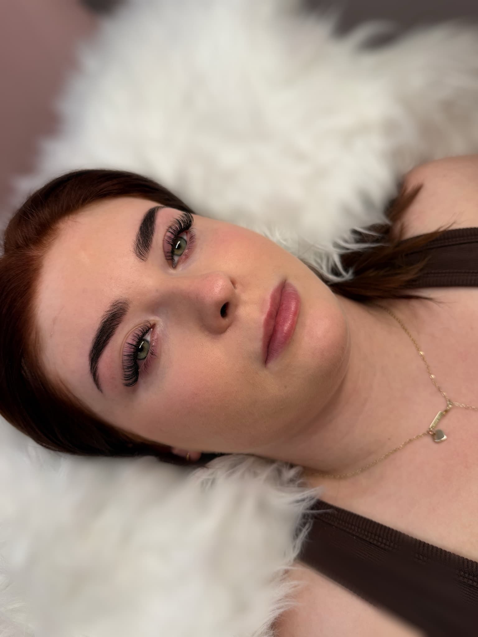 Hybrid lashes Wallsend - wispy set with laminated brows on green eyes