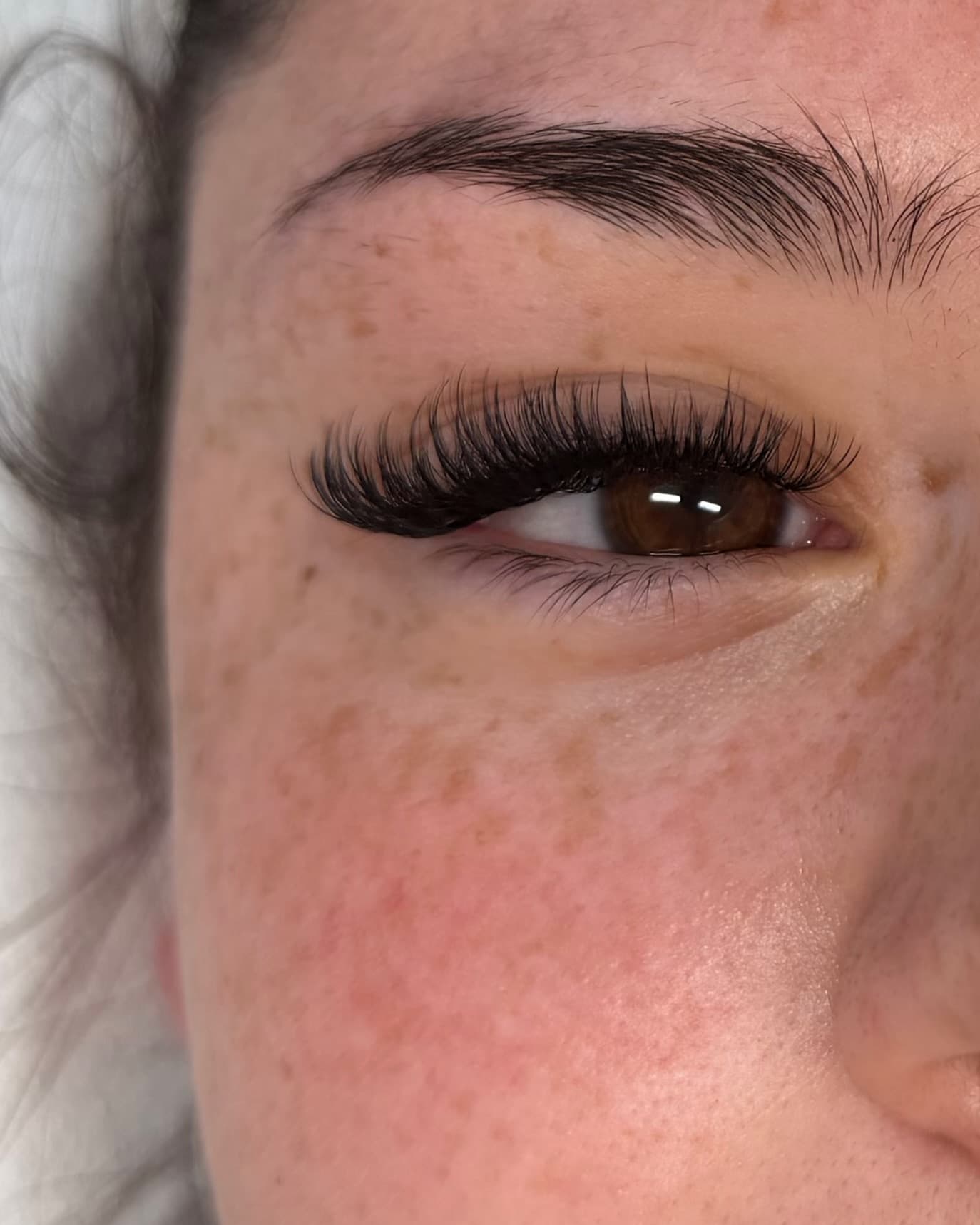 Russian volume lash extensions Newcastle - close-up of fanned lash line